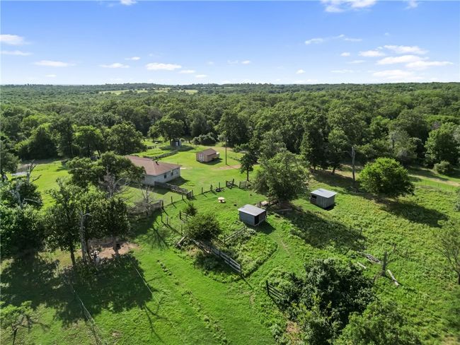 View of rural area with a heavily wooded area | Image 36