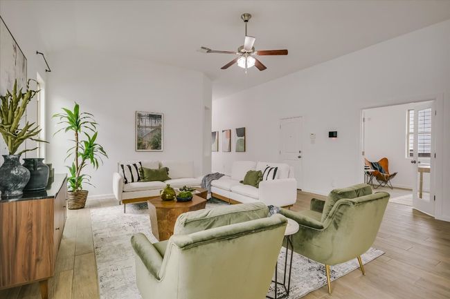The high ceilings, fresh paint and abundant natural light make this a welcoming space to both relax and entertain. | Image 5