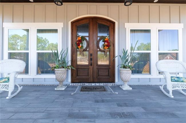 View of exterior entry with french doors | Image 5