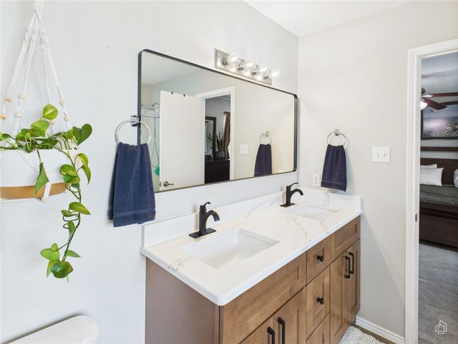 Full bathroom featuring double vanity and a ceiling fan | Image 13