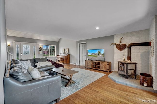 Living room with woodburning stove | Image 17