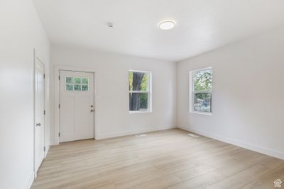 Foyer with light hardwood / wood-style flooring | Image 3