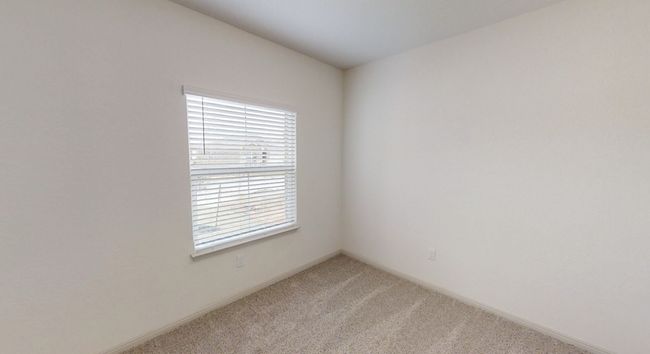Empty room with light colored carpet and baseboards | Image 10