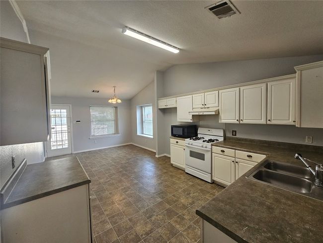 4211 Mather, House other with 4 bedrooms, 2 bathrooms and 2 parking in Kyle TX | Image 9