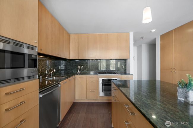 Beautiful modern kitchen with tons of cabinet space | Image 18