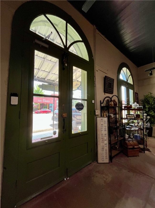 Front entrance interior/French Doors with arched window leading to Main Street. | Image 12