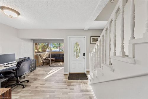 102 E Greens Blvd, LEHIGH ACRES, FL, 33936-5285 | Card Image