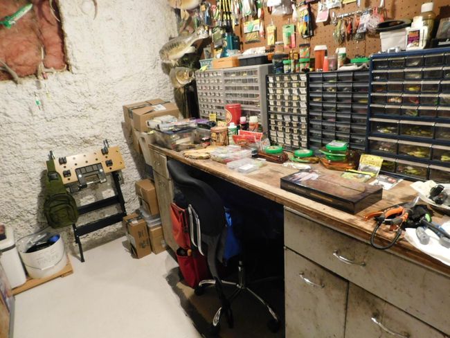 Basement has a large work bench with cabinets. | Image 37