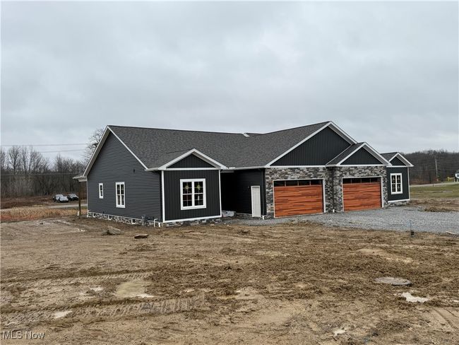 View of front of home with a garage | Image 20
