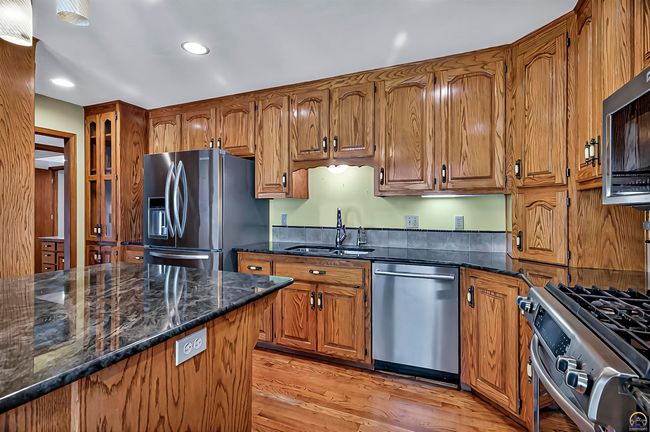 3835 Sw Wood Valley Dr, House other with 5 bedrooms, 3 bathrooms and null parking in Topeka KS | Image 5
