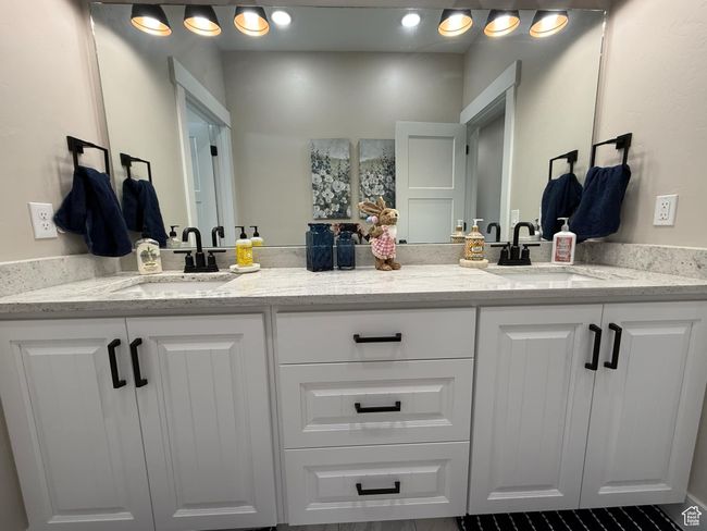 Bathroom featuring double vanity and a sink | Image 63