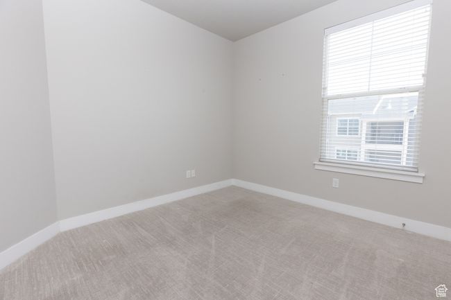 Carpeted spare room with baseboards | Image 18