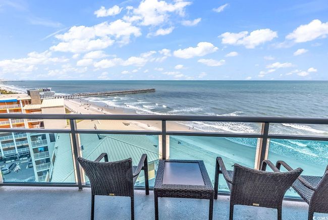 Balcony featuring a water view | Image 31