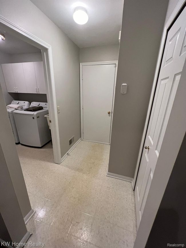 Garage Door opens to Closet, Laundry and kitchen. | Image 12