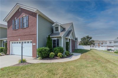 View of the front of the home with 2 car garage. | Image 2