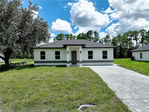 940 Lakeside Dr, LEHIGH ACRES, FL, 33974-9561 | Card Image