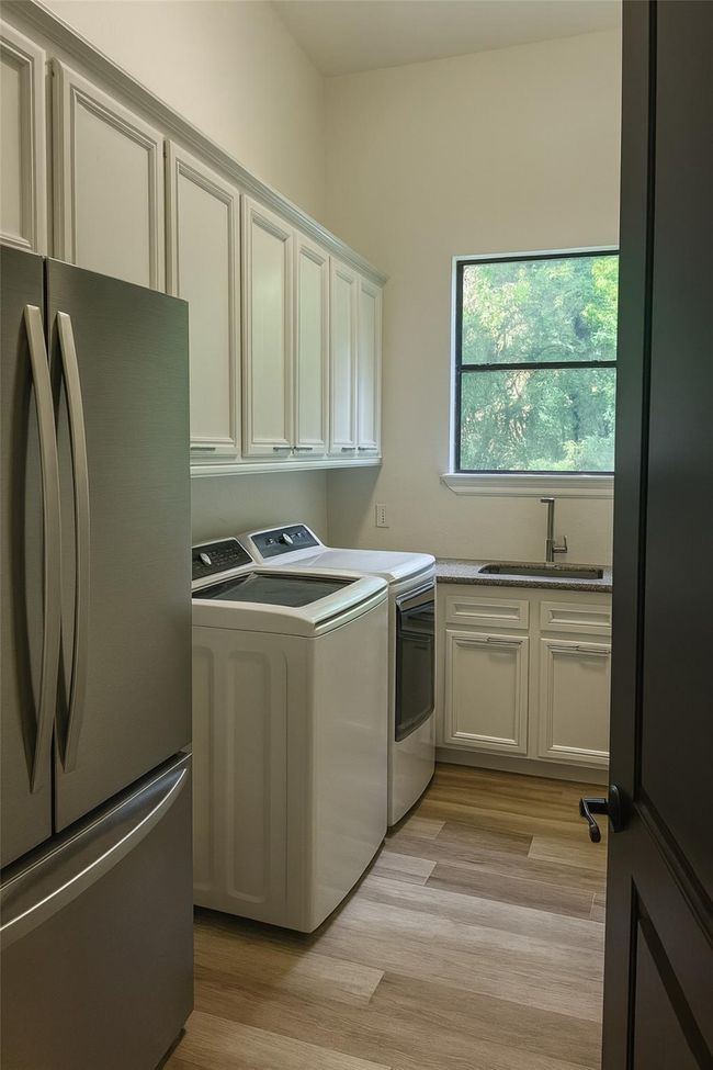 large utility room with all hook-ups | Image 21