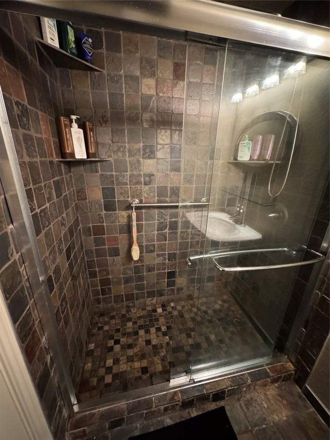 Full bathroom featuring a stall shower | Image 10