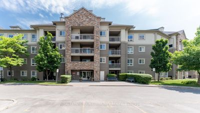 410 - 8 Dayspring Cir, Condo with 1 bedrooms, 1 bathrooms and 1 parking in Brampton ON | Image 1