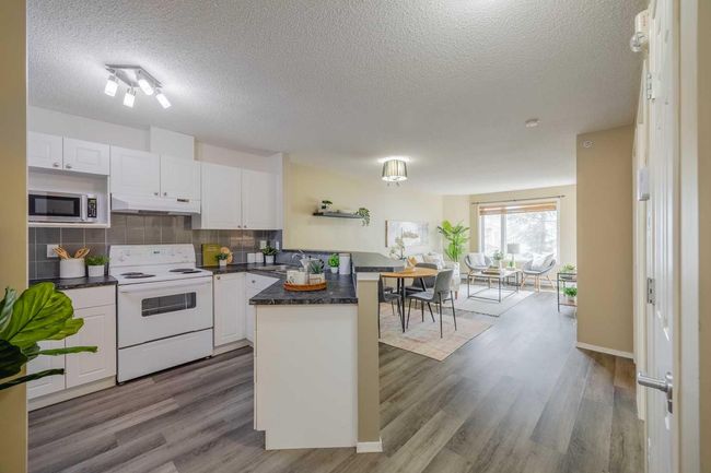 1311 - 950 Arbour Lake Rd Nw, Condo with 2 bedrooms, 1 bathrooms and 1 parking in Calgary AB | Image 8