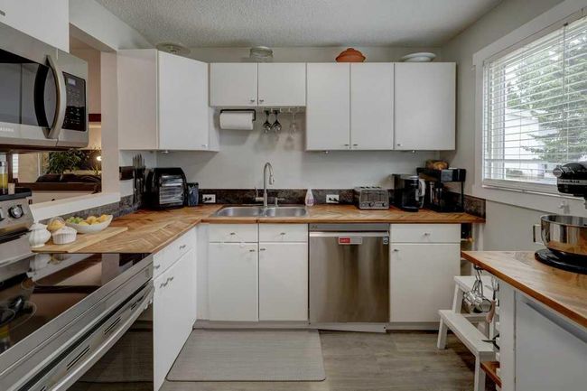 52 - 4810 40 Avenue Sw, Townhouse with 4 bedrooms, 2 bathrooms and 1 parking in Calgary AB | Image 5