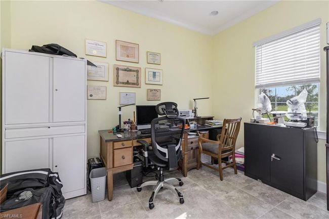 Office featuring crown molding | Image 12