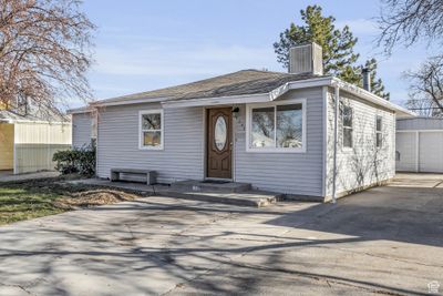 View of front of house featuring a garage | Image 1