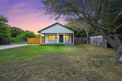 View of front of property with a lawn | Image 1