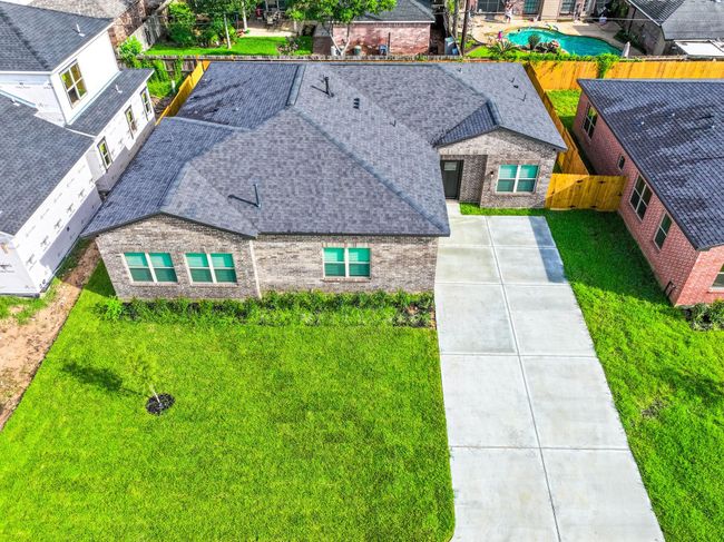 Wide driveway leads to attached garage with plenty of room | Image 41