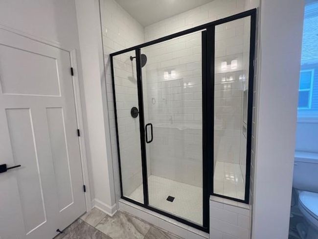 Photo of actual home. The primary walk-in closet. | Image 9
