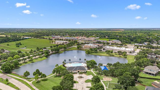 Large neighborhood pond, pool, club house and splash pad. | Image 30
