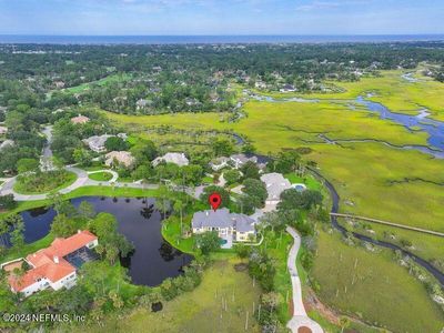 Sits on 1.4 acres in Marsh Landing | Image 3