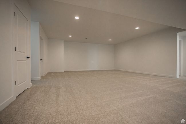 Spare room featuring recessed lighting, light carpet, and baseboards | Image 39