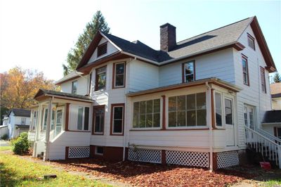 Back of property featuring a sunroom | Image 3