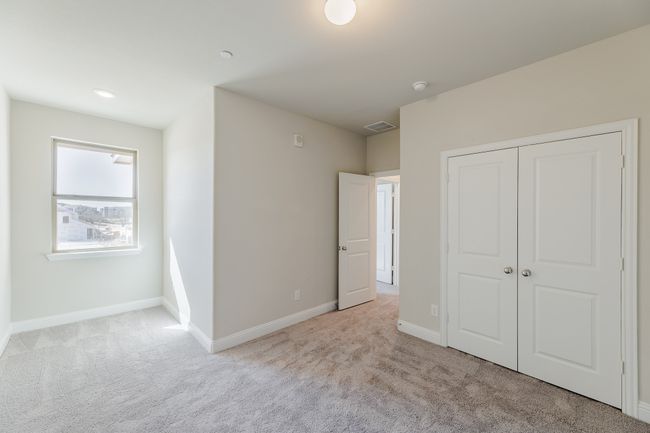 Unfurnished bedroom with carpet and a closet | Image 24