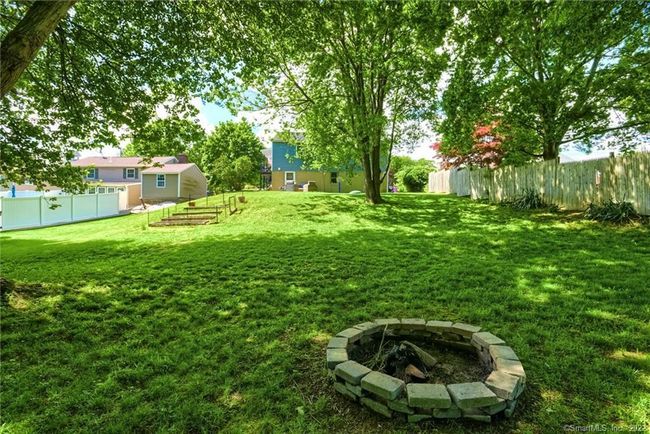Backyard looking up to the house | Image 30