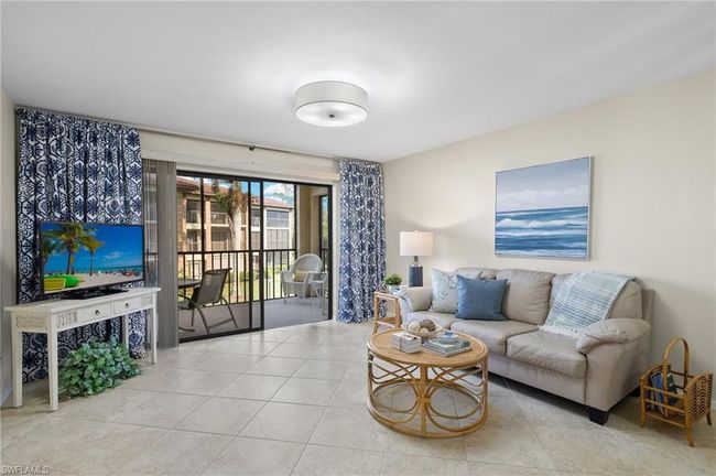 View of tiled living room | Image 4