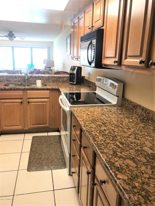 4102-8494 Ridgewood Ave, Cape Canaveral, FL, 32920-2100 | Card Image