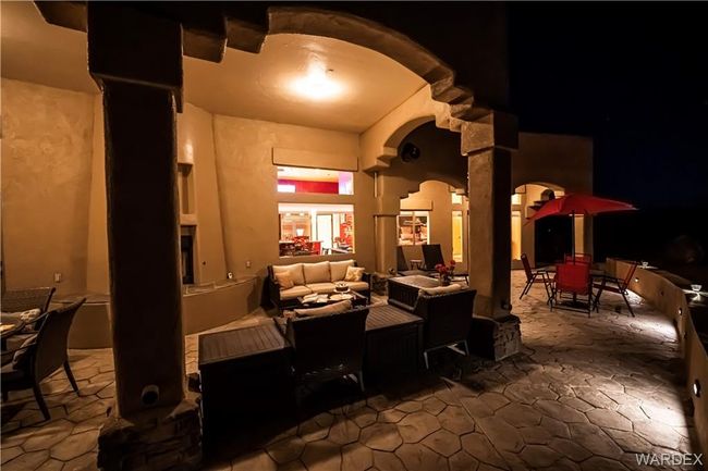 View of patio with outdoor dining space and an outdoor hangout area | Image 22