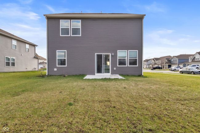 back of property with a patio area and a lawn | Image 34