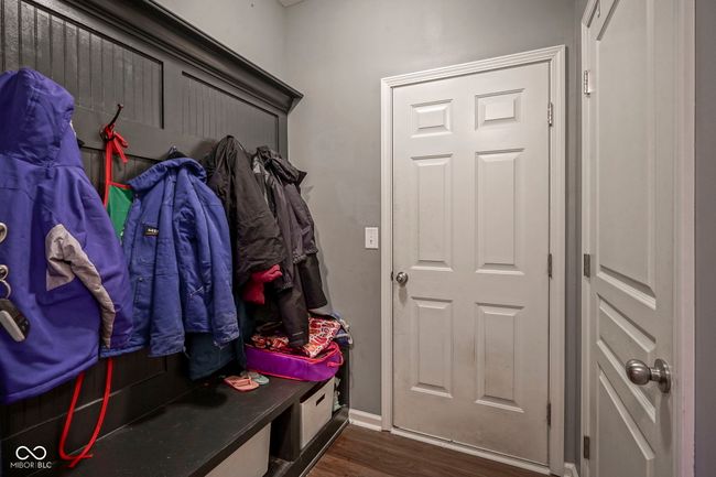mudroom with dark wood-style floors and baseboards | Image 32
