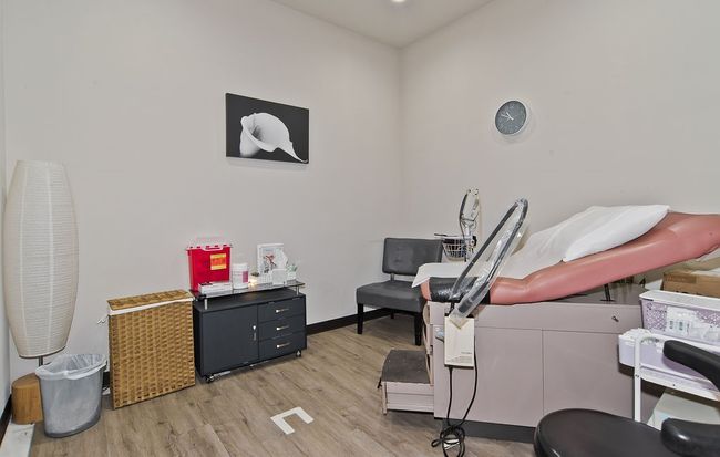 Misc room featuring light wood-style floors and baseboards | Image 18