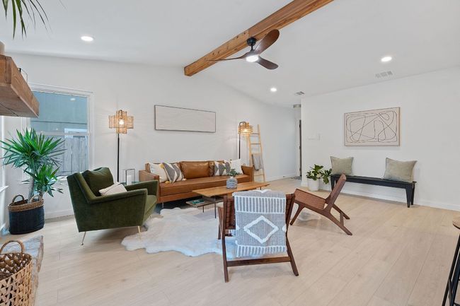 Living room with a ceiling fan, light wood-type flooring, and recessed lighting | Image 4