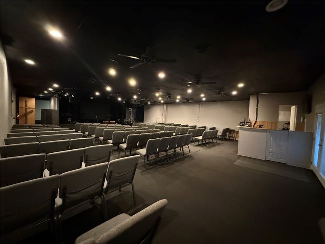Cinema with a ceiling fan, carpet flooring, and recessed lighting | Image 12