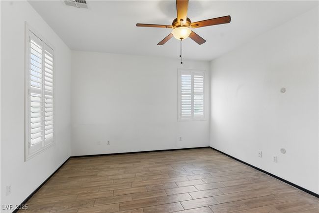Living room with tile finished floors | Image 5