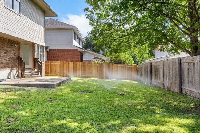 Fenced backyard featuring a patio area and entry steps | Image 28