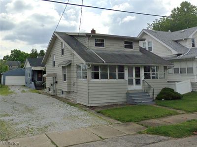 View of front of property with an outdoor structure | Image 1