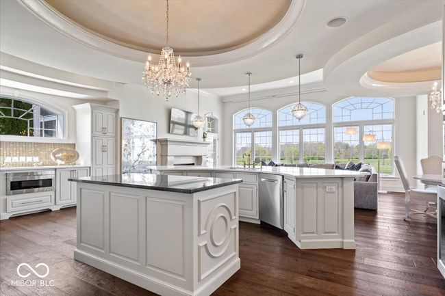 Custom, circular ceiling features all new crystal chandeliers. | Image 19