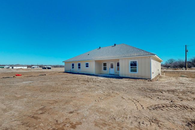 Rear view of property with roof with shingles | Image 7