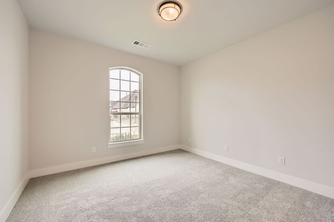 Spare room featuring baseboards, visible vents, and carpet | Image 23